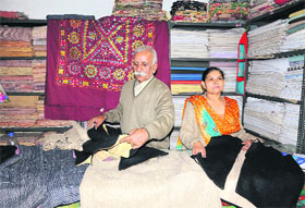 Employees of District Khadi Board at the khadi shop situated opposite the railway station in Bathinda.