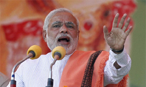 Narendra Modi goes from state to state spreading his message of development with large dollops of Congress-bashing