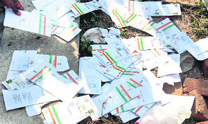 Aadhaar cards abandoned at Bahu Jhholari village in Jhajjar. 