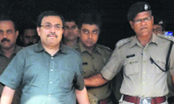 Suspended Rajya Sabha member of TMC Kunal Ghosh being produced in a court in connection with the Saradha Chit Fund scam, in Kolkata on Sunday. 