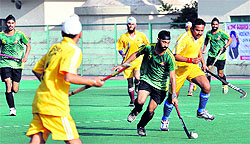 Players in action during the Sant Gurbaksh Singh Danna Memorial Hockey Tournament in Jammu on Sunday