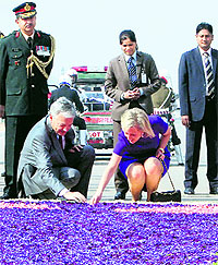 Princess Astrid of Belgium inaugrates a flower carpet in commemoration of World War I soldiers after laying a wreath at the Amar Jawan Jyoti at India Gate in New Delhi on Sunday