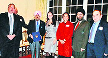 Kanwal Prakash Singh (third from left) receives the Community Service Award from the FBI Citizens Academy of Indianapolis