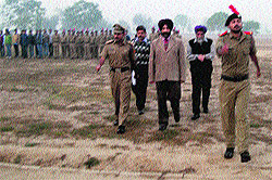 Dr Jasbir Singh Hundal, director of the GZS PTU campus, inspects the NCC parade in Bathinda on Monday
