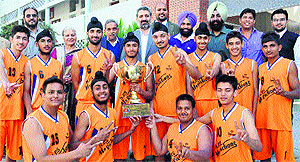 The winners with the trophy in Chandigarh on Monday