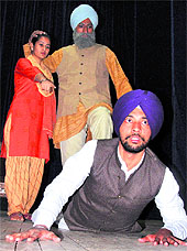 Artistes enact a scene from the play, “Tandoor”, on the inaugural day of the Gursharan Singh Theatre Festival at Punjab Kala Bhawan, Sector 16, Chandigarh, on Monday