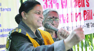 Actvists under the banner of National Federation of Indian Women shouting slogans during a dharna, demanding the Women's Reservation Bill in New Delhi on Monday.