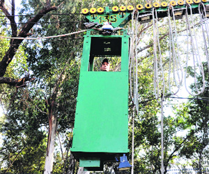 A BSF personnel inside a bullet-proof mobile chamber during a demonstration of the surveillance system in Jammu on Monday. 