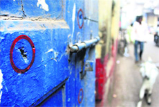 Bullet marks at a door near Nariman House in Mumbai. 