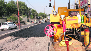 A road being carpeted ahead of the World Cup Kabaddi in Bathinda on Tuesday.