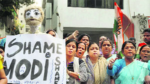Congress women activists protest against Gujarat Chief Minister Narendra Modi in connection with the snooping case in Kolkata