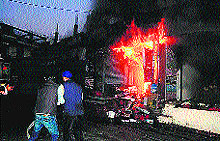 Fire billows from a shop at Kotwali bazar in Dharamsala on Tuesday evening