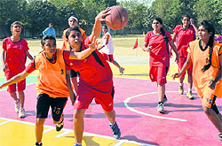A match in progress during the Ludhiana Sahodaya School Complex Basketball Tournament at BCM School in Ludhiana on Tuesday