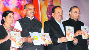 (From left); BJP leaders Sushama Swaraj, Vijay Goel, Delhi CM candidate Harsh Vardhan and Arun Jaitley release the party manifesto in New Delhi on Tuesday. 