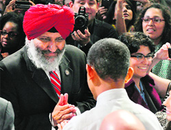 US President Barack Obama greets attendees after speaking on immigration reform in San Francisco on Monday. 