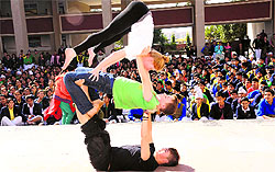 German students present an item at a function organised as part of a cultural exchange programme at Ryan International School, Sector 49, Chandigarh, on Wednesday
