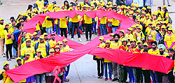Yuvsatta, an NGO, organised ‘Condom Naama’, a condom promotion programme, at Sector 17 Plaza, Chandigarh, along with the UT State AIDS Control Society, the NSS Unit of Postgraduate Government College, Sector 11, Chandigarh, and HLL Lifecare Limited. Around 400 volunteers, mostly girls, organised several events during the day. Volunteers carried placards reading Abstain, Be faithful or Condomise. In the above picture, students carry a Red Ribbon, an international symbol for AIDS awareness, at the Sector 17 plaza on Wednesday