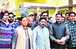 BJP workers protest against rise in vegetable and fruit prices in Dehradun on Wednesday