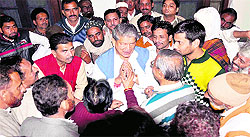 Union Minister for Water Resources Harish Rawat meets litigants during a janata darbar programme in Haridwar on Wednesday