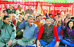 Members of the Left parties and women organisations hold a protest in Dehradun on Wednesday