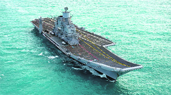 The induction of INS Vikramaditya has added to India's maritime muscle but it would be a grave error to underestimate China's rapid expansion of its naval power