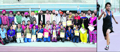 The winners of the Ludhiana District Inter-Zonal Athletics Meet pose for a photograph; and (right) an athlete in action. 