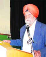 SS Johl, Chancellor, Central University of Punjab, Bathinda, addresses dignitaries at the annual function of the Guru Nanak International Educational Trust (London) in Ludhiana on Wednesday.