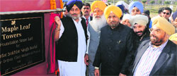 Deputy Chief Minister lays the stone of a township in Amritsar on Wednesday. Tribune photo: Vishal Kumar
