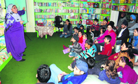 Storyteller Rukhsana Khan during a reading session at the One Up Library in Amritsar on Thursday.