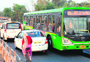 Traffic bottlenecks on the narrow bridge on the Daddu Majra-Dhanas road. 