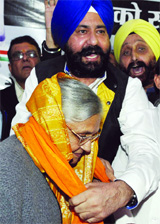 All India president of the Youth SAD (Delhi)Raja Harpreet Singh offers saropa to Chief Minister Sheila Dikshit in New Delhi on Thursday.