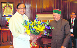 Chief Minister Virbhadra Singh calls on Union Finance Minister P Chidambaram in New Delhi on Thursday. Tribune photo