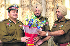 Senior police officials welcome new Zonal IG Balbir Kumar Bawa (right) in Jalandhar on Thursday. Tribune Photo: Malkiat Singh
