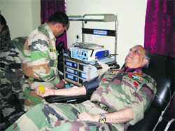 GOC-in-C, Northern Command, Lt Gen Sanjiv Chachra, donates blood at a camp in Udhampur on Thursday.