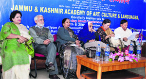 Dignitaries sit on the dais during the two-day Hindi conference, Hindi ke samaksh: Chunoutiyan avam samadhan, at KL Saigal Hall in Jammu.