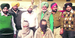 The accused in police custody in Jagraon. A Tribune photograph
