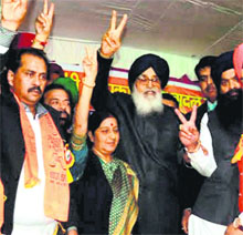 Punjab Chief Minister Parkash Singh Badal and BJP leader Sushma Swaraj campaign for a BJP candidate at Harinagar in New Delhi on Thursday