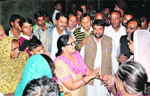  Congress candidate Vinod Chaudhary's wife Vijay Laxmi campaigns in Hanumangarh on Thursday.