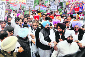 PPCC chief Partap Bajwa leads a protest against fresh taxes in Bathinda on Thursday
