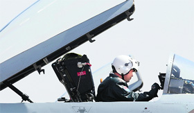 A pilot sits in the cockpit of a Jian-10 fighter jet at the Yangcun Air Force base in China.