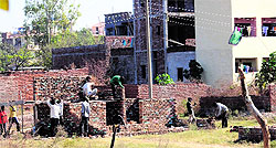An illegal structure being built on the outskirts of Dhanas village