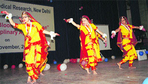 Girls perform during the national seminar on child abuse at the IGMC in Shimla on Friday
