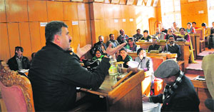 Mayor Sanjay Chauhan addresses the House at the municipal corporation office in Shimla on Friday. 