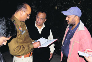 Police officials conduct a probe into the dowry death case in Jalandhar on Friday