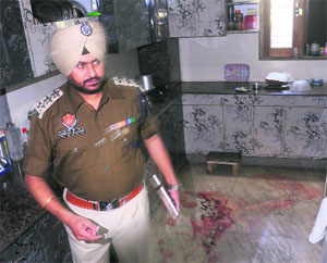 ACP (Crime) GS Bains inspects the crime scene in Ludhiana