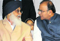 Punjab CM Parkash Singh Badal and BJP leader Arun Jaitley at a rally in Delhi on Friday. Tribune photo: Manas Ranjan Bhui