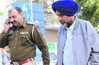 Dr Arjinder Singh at a Mohali court on Friday. Tribune photo: Vicky Gharu