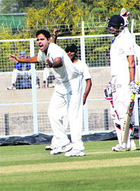 Haryana seamer Sanjay Budhwar appeals against a Punjab batsman at Lahli on Friday.