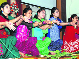 Students perform a dance item during the awards felicitation function at the Khalsa College of Education in Amritsar on Saturday. 