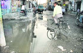 Sewage accumulates on the railway road in Jalandhar on Saturday